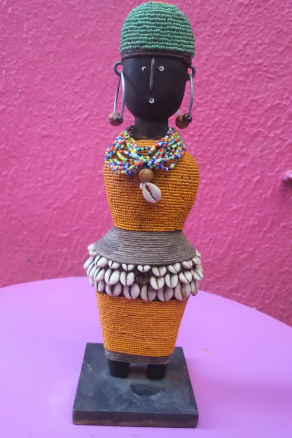 Namji Doll — Handcrafted Wood & Beads ( Orange) £145 Namji Doll — Handcrafted Wood & Beads ( Orange) £145